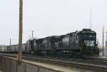 NS 8833 leads a train out of the yard